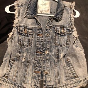 Distressed denim vest